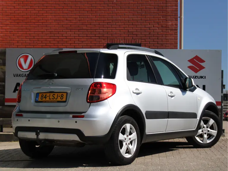 Suzuki SX4 1.6 Exclusive, Trekhaak, parkeersensoren, 2e Eig. Keyless en Middenarmsteun afbeelding 13