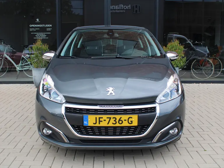 Peugeot 208 1.2 PureTech Allure Navigatie, Climate control, Lichtmetalen Velgen afbeelding 3