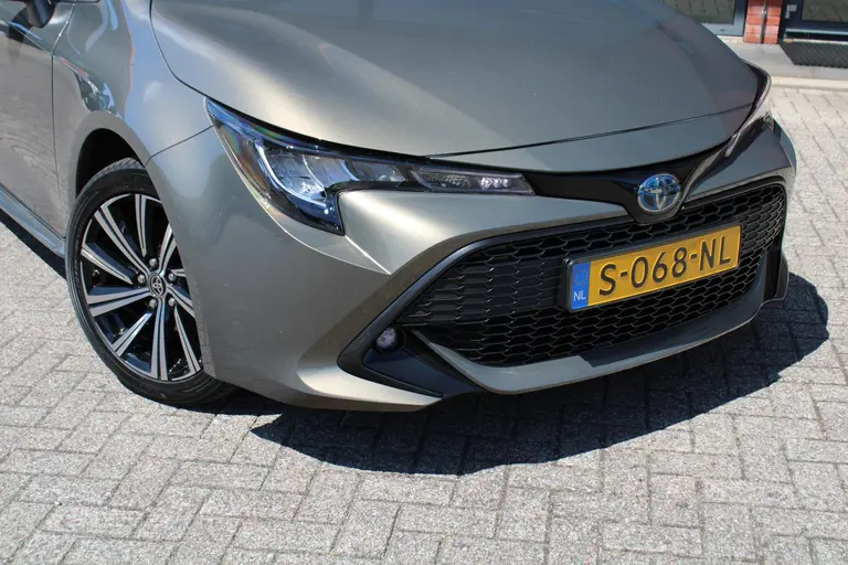 Toyota Corolla Touring Sports 1.8 Hybrid Dynamic Automaat, Trekhaak, All-Seasons en 1e Eigenaar! afbeelding 30