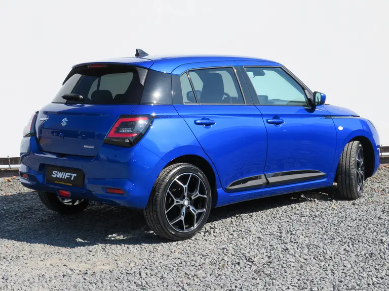 Suzuki Swift 1.2 Select Smart Hybrid, SPECIALE JUBILEUM EDITION!! 17 inch LM-Velgen, Stripingpakket en Shark Fin Antenne afbeelding 4