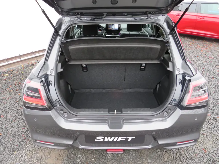Suzuki Swift 1.2 Style Smart Hybrid, NIEUW 6 JAAR GARANTIE! Bodykit en Stootlijsten in Piano Black afbeelding 8
