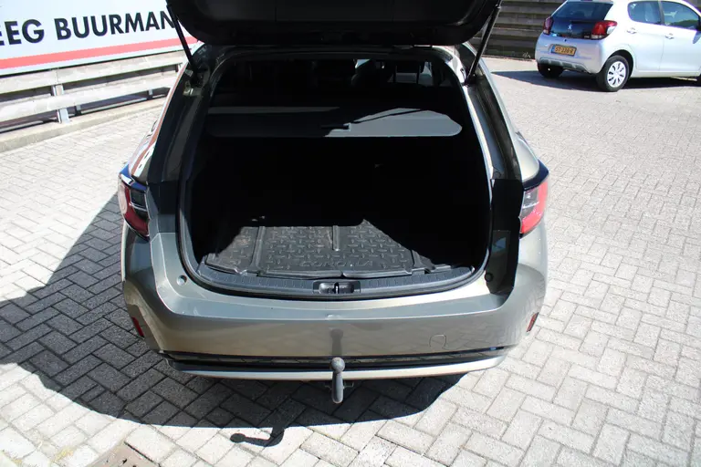 Toyota Corolla Touring Sports 1.8 Hybrid Dynamic Automaat, Trekhaak, All-Seasonbanden en 1e Eigenaar! afbeelding 13