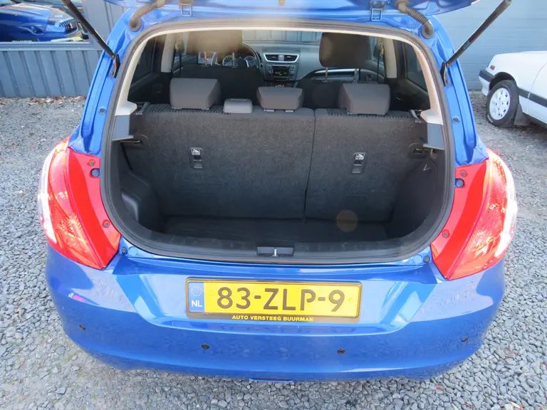 Suzuki Swift 1.2 Exclusive EASSS Speciale uitvoering, All-Seasons, Cruise/Climate-Control, Parkeersensoren en Verwarmde Voorstoelen afbeelding 11
