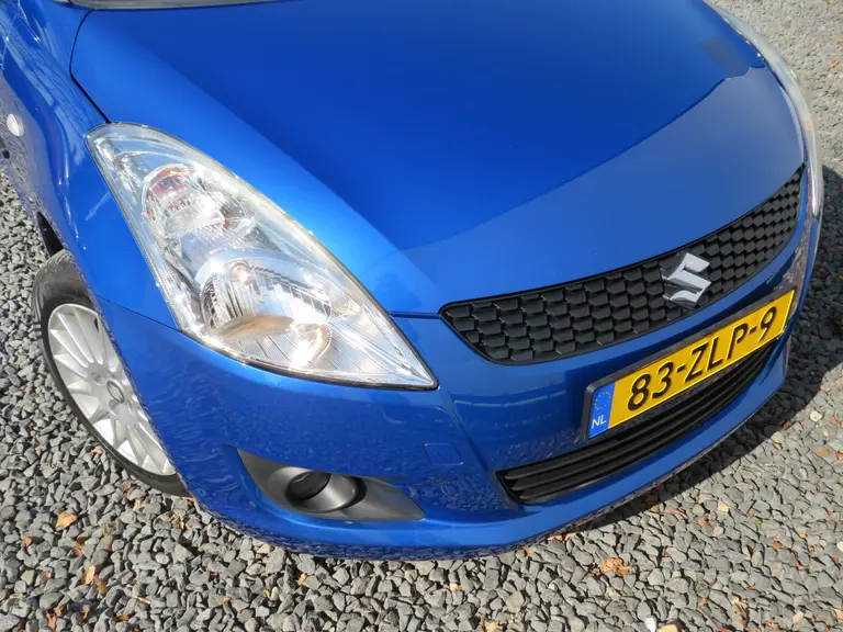 Suzuki Swift 1.2 Exclusive EASSS Speciale uitvoering, All-Seasons, Cruise/Climate-Control, Parkeersensoren en Verwarmde Voorstoelen afbeelding 28