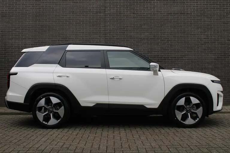 KGM Torres EVX Titanium 73.4 kWh 207pk, Grand White, 20"inch LM velgen Trekgewicht 1.500 KG. 7 jaar garantie! afbeelding 2