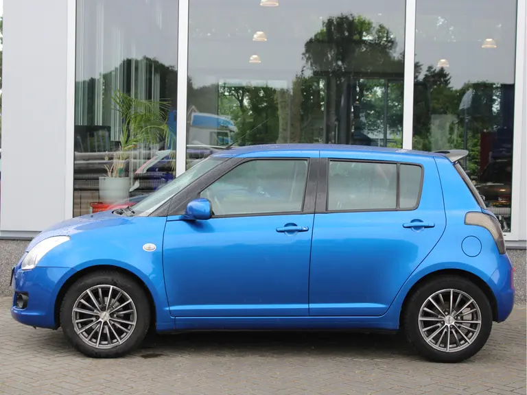 Suzuki Swift 1.3 Xpression 5-Deurs 17" Lichtmetalen Velgen, Radio/CD Speler, Airco, Dealeronderhouden afbeelding 4