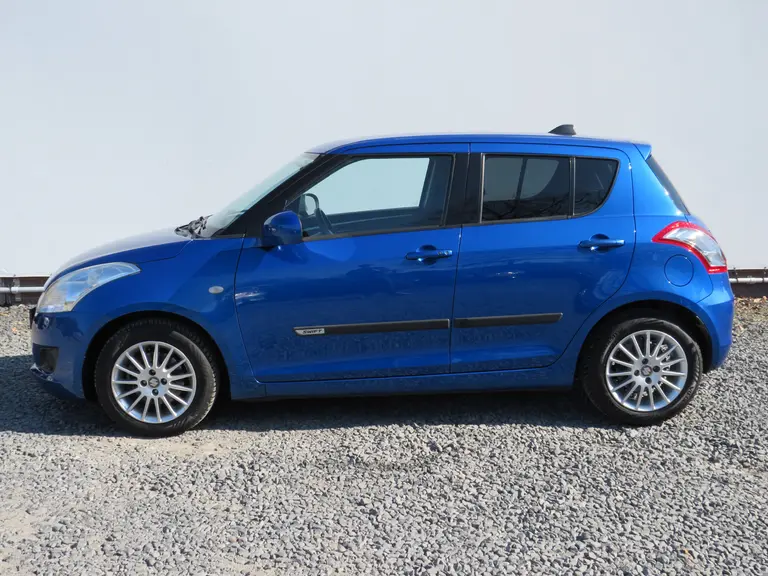 Suzuki Swift 1.2 Exclusive EASSS Speciale uitvoering, All-Seasons, Cruise/Climate-Control, Parkeersensoren en Verwarmde Voorstoelen afbeelding 2