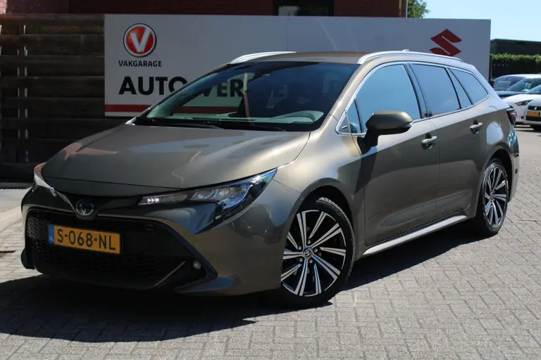 Toyota Corolla Touring Sports 1.8 Hybrid Dynamic Automaat, Trekhaak, All-Seasons en 1e Eigenaar! afbeelding 5
