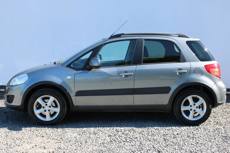 Suzuki SX4 1.6 4Grip Exclusive, Trekhaak, Cruise Control, Keyless, Climate Control en Dealer onderhouden! afbeelding 2