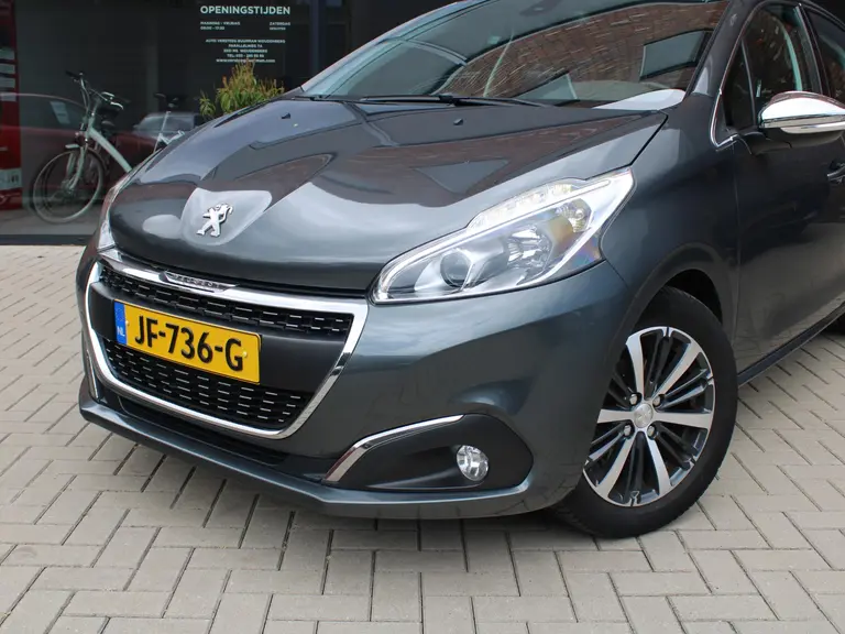 Peugeot 208 1.2 PureTech Allure Navigatie, Climate control, Lichtmetalen Velgen afbeelding 2