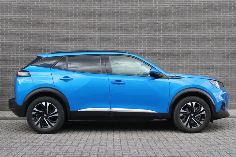 Peugeot e-2008 EV Allure Pack 50 kWh Navigatie, CruiseControl, Keyless Start, Airco, Applecarpl./Andr. Auto afbeelding 2