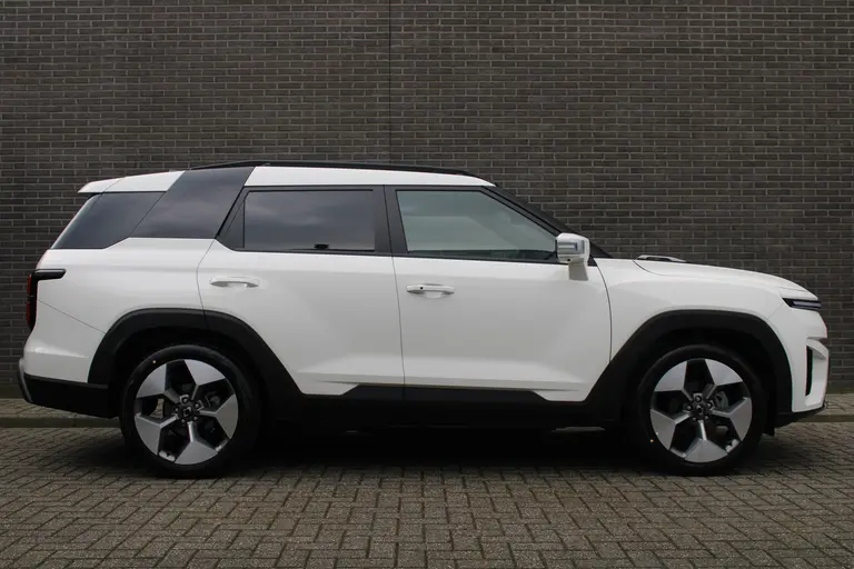 KGM Torres EVX Titanium 73.4 kWh 207pk, Grand White, 20"inch LM velgen 7 jaar garantie! afbeelding 2